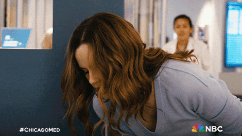 a woman in a blue shirt with nbc on the bottom