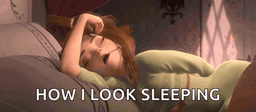 a cartoon character is sleeping in a bed with the words how i look sleeping above her .