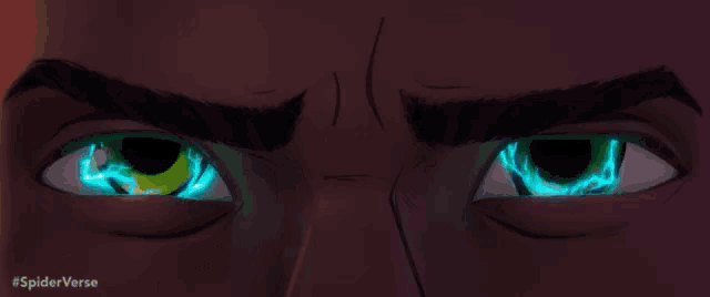 a close up of a person 's eyes with glowing blue eyes
