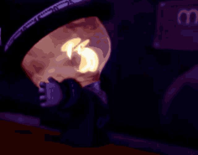 a person wearing a black helmet with a measuring tape around their head that reads 10 15 20 25 30