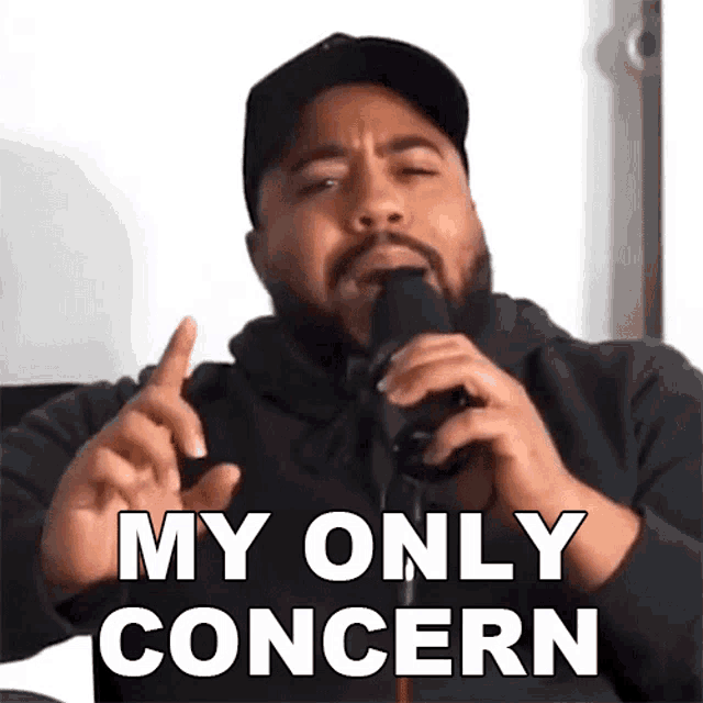 a man speaking into a microphone with the words " my only concern " on the bottom