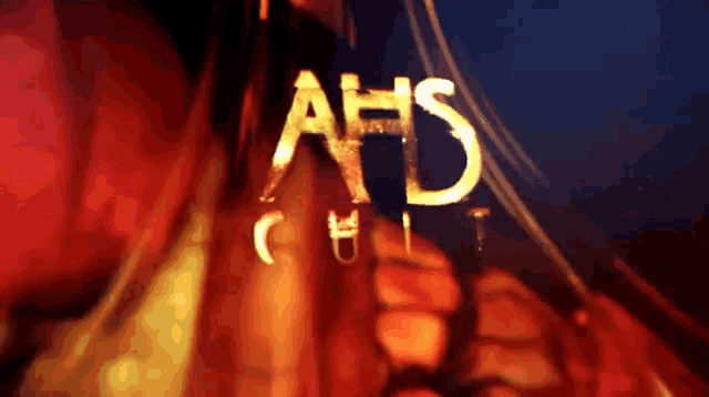 a close up of a sign that says ' ahs cult '