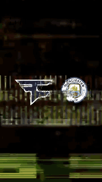 manchester city and new england patriots logos on a dark background