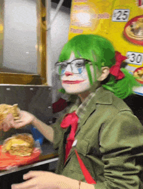 a person dressed as a clown eating a sandwich
