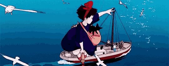 a girl is flying on a boat in the ocean .