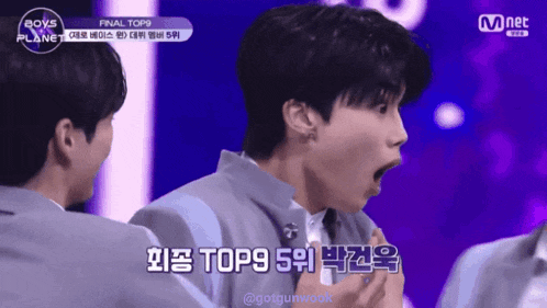 a man with a surprised look on his face is in a mnet video