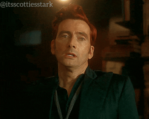 a man with red hair says you were right in a dark room