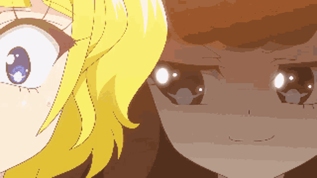a close up of a girl 's eyes with a yellow haired girl in the background