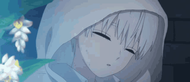 a boy with white hair is wearing a white hoodie and sleeping