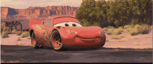 lightning mcqueen from the movie cars is smiling