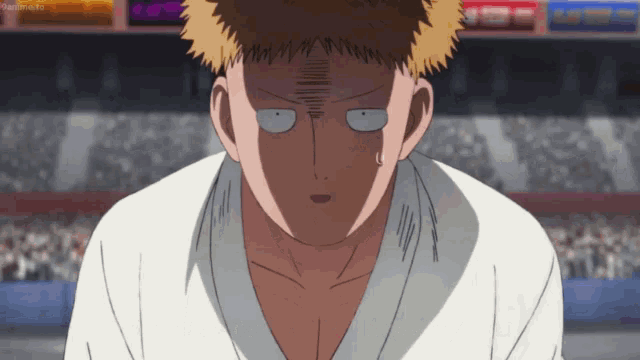 a close up of a cartoon character 's face with an anime.to logo in the corner