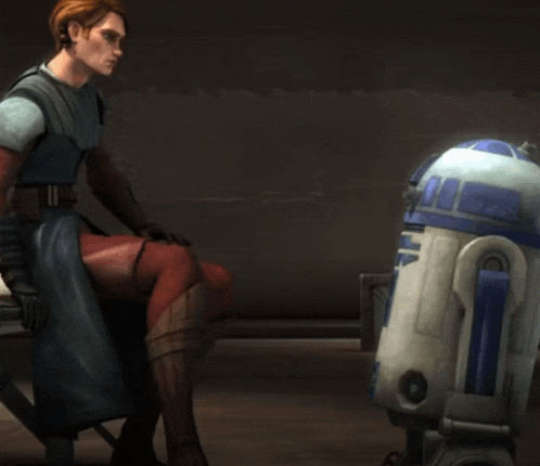a man sitting next to a r2d2 robot with a blue stripe on it