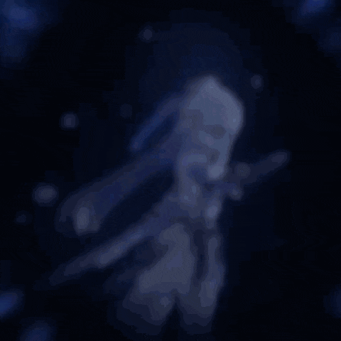 a blurred image of a girl holding a sword in her hand .