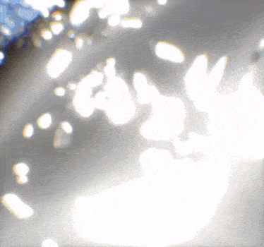 a gray background with a lot of white dots on it