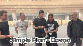 a group of men standing in a room with the words simple plan-davao written on the bottom