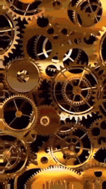 a close up of a bunch of gold gears on a black background .