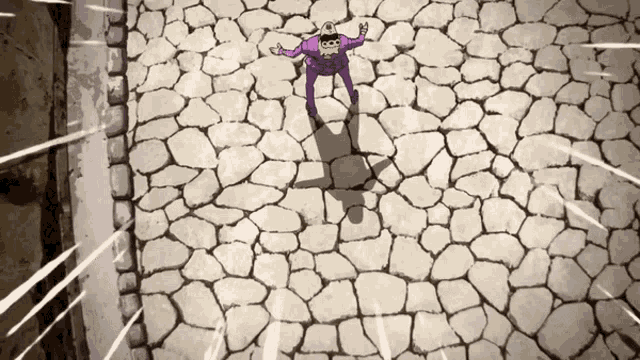 a man in a purple shirt with a batman logo on it is standing on a cobblestone street