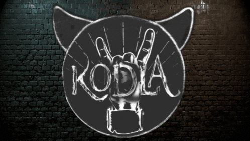 a drawing of a cat with the word kodia written on it