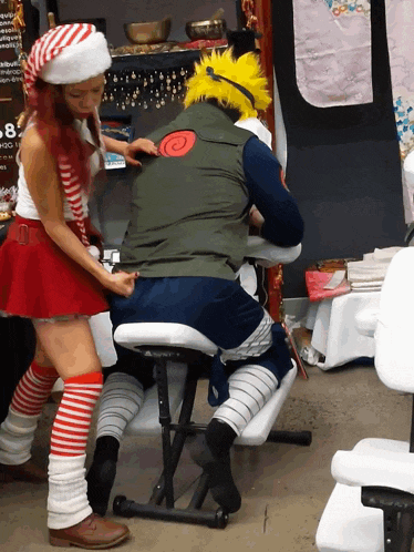 a man in a naruto costume is getting a massage