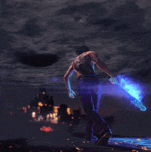 a man with a tattoo on his back is holding a blue object in his hand
