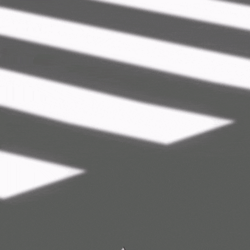 a girl with a sword is crossing a crosswalk with her eyes closed