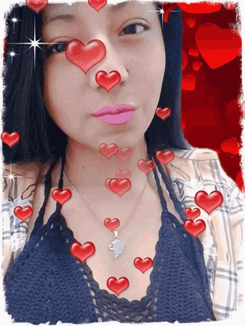 a girl with hearts on her face and a heart necklace