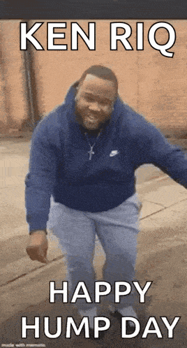 a man in a blue sweatshirt and blue pants is dancing on a sidewalk .