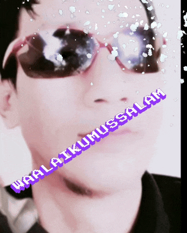 a man wearing sunglasses has the words waalatikumussalam written in purple