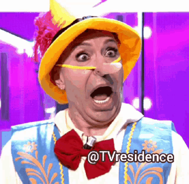 a man in a clown costume with the words @tvresidence below