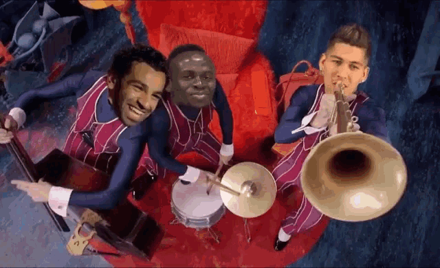 three men are playing instruments including a trombone