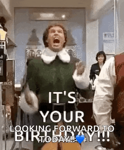 a man in a green sweater is standing in a room and screaming .