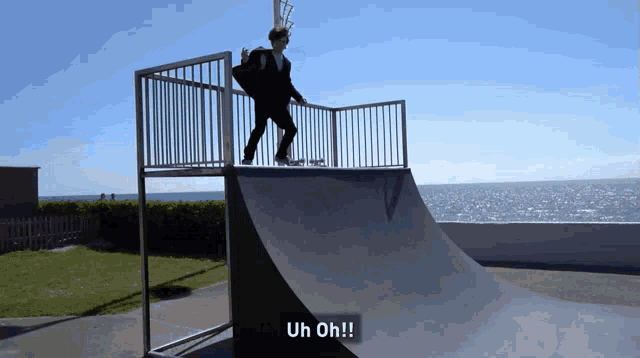 a person riding a skateboard on a ramp with the words uh oh written below