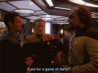 Care For A Game? GIF - Dart Darts Game Of Darts GIFs