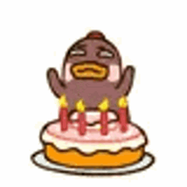 a cartoon penguin is standing on top of a birthday cake with candles .