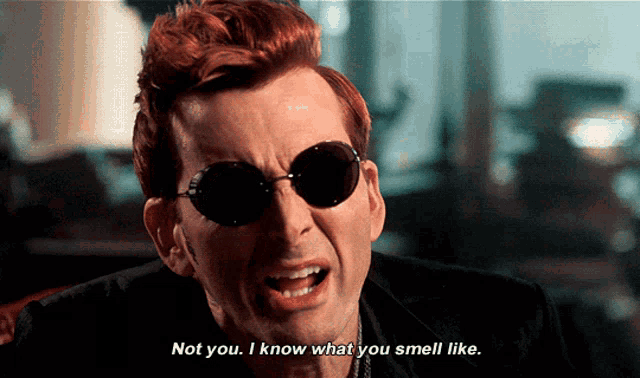 a man wearing round sunglasses says " not you . i know what you smell like "