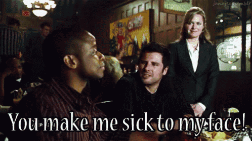 a group of people are sitting at a table and one of them is saying you make me sick to my face