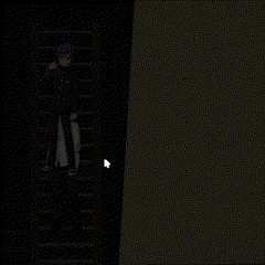 a person standing next to a wall in a dark room .