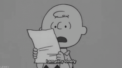 a black and white cartoon of charlie brown holding a piece of paper and saying " i am very lonely "