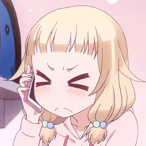 a girl with blonde hair talking on a cell phone
