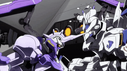a purple and white robot with the letter t on it
