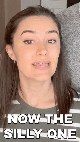 a woman says now the silly one in front of a man