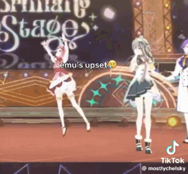 a group of anime characters are dancing on stage .