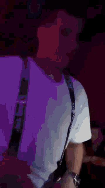 a man wearing suspenders that say jack daniel 's
