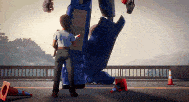 a woman is standing next to a blue robot on the road