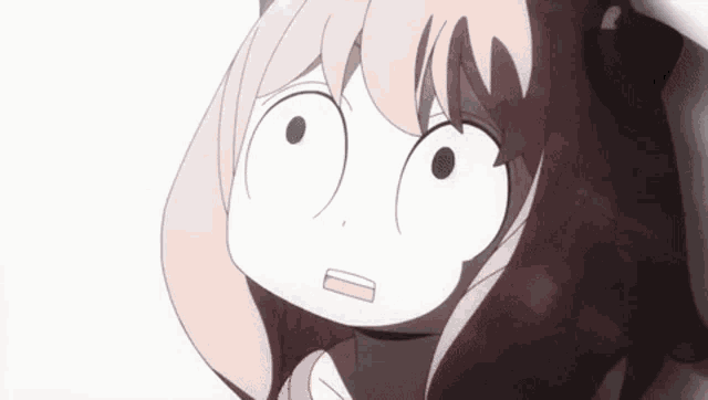 a close up of a cartoon girl making a funny face .