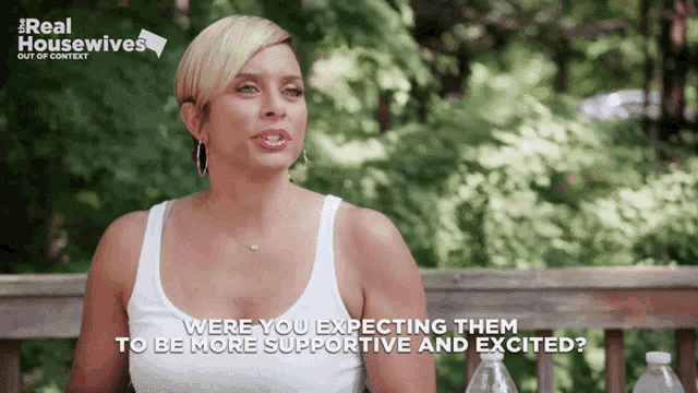 a woman in a white tank top says were you expecting them to be more supportive and excited ?