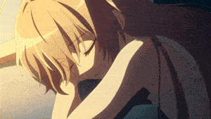 a girl with long hair is laying down with her head on her arm