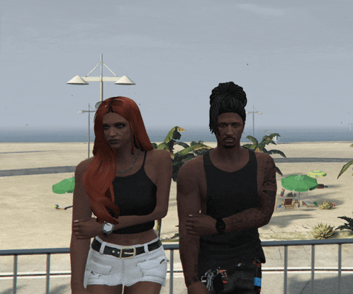 a man and a woman standing next to each other on the beach