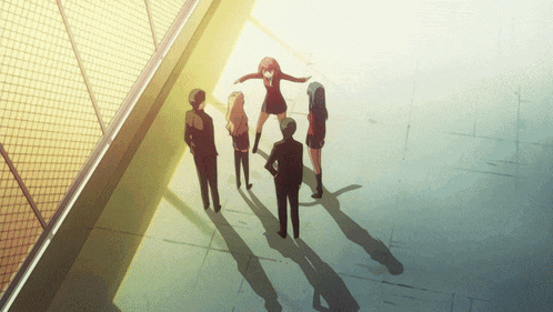 a group of people are standing in a circle with a girl standing in the middle