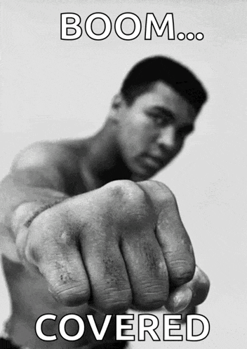 a black and white photo of a man 's fist with the words boom covered